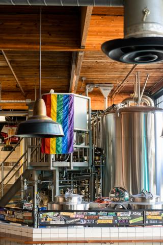 Capitol Hill brewery with a pride flag in the background